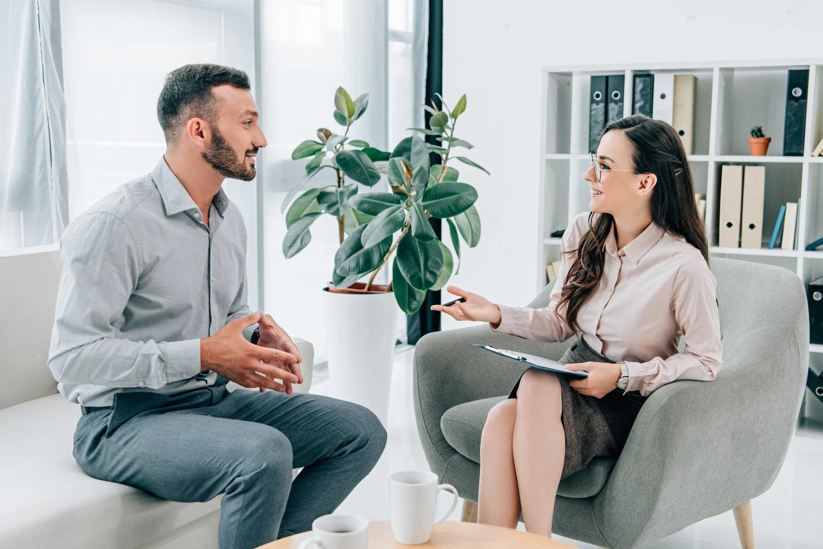 Two adults having a support consultation